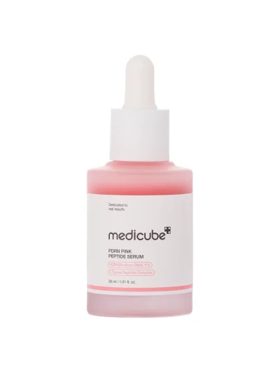 A professional shot of Medicube PDRN Pink Peptide Serum in its frosted pink bottle, designed for daily skin elasticity and radiance.